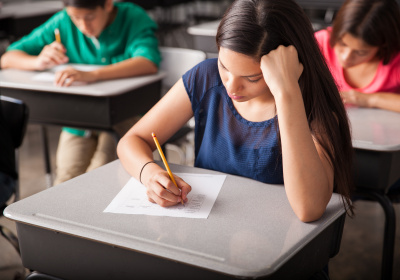 group-high-school-students-taking-test-classroom